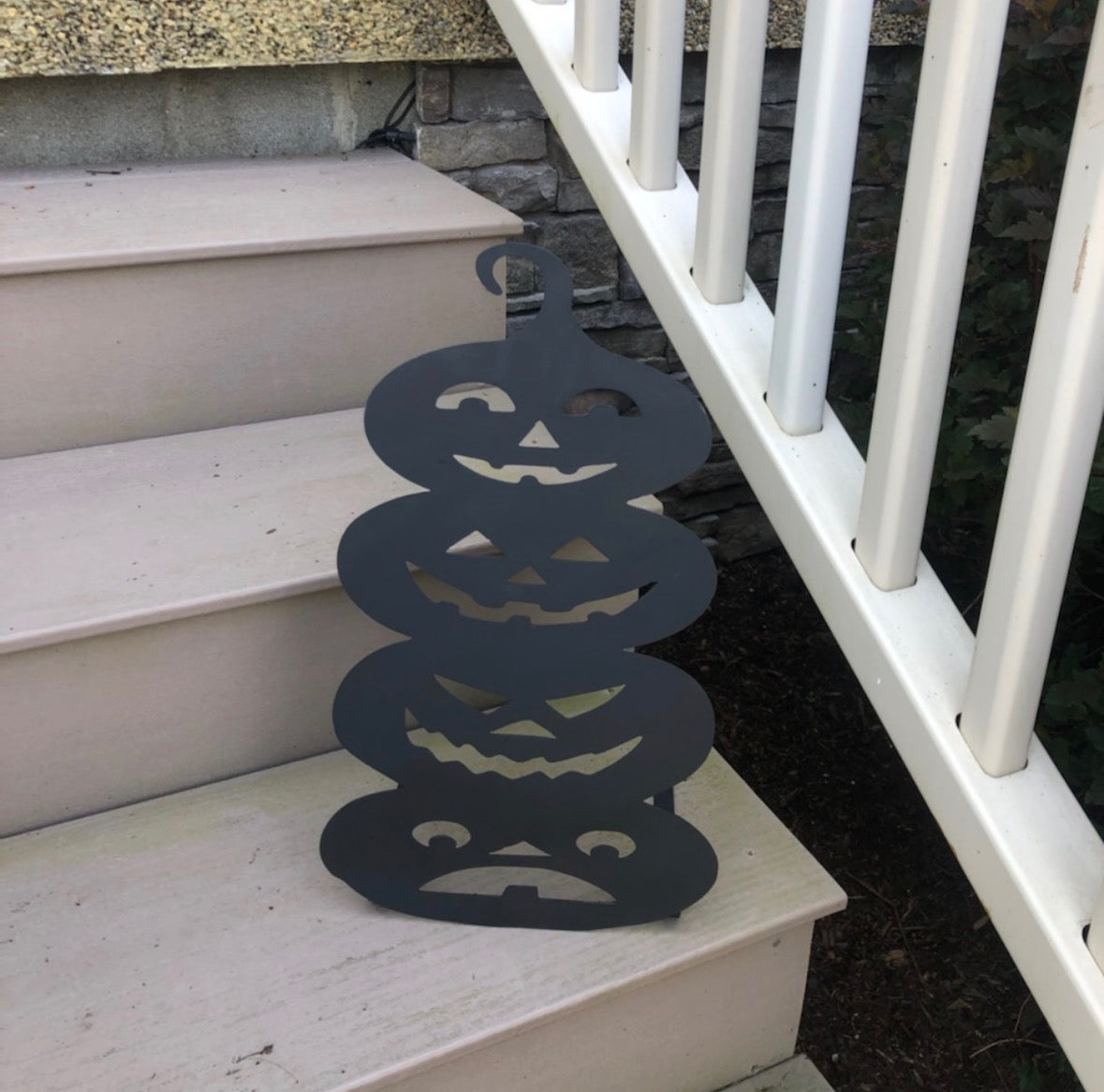 4 Stacked Carved Pumpkins