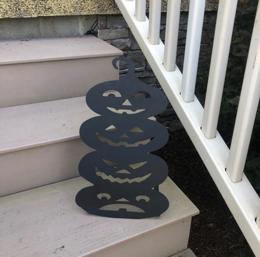 4 Stacked Carved Pumpkins