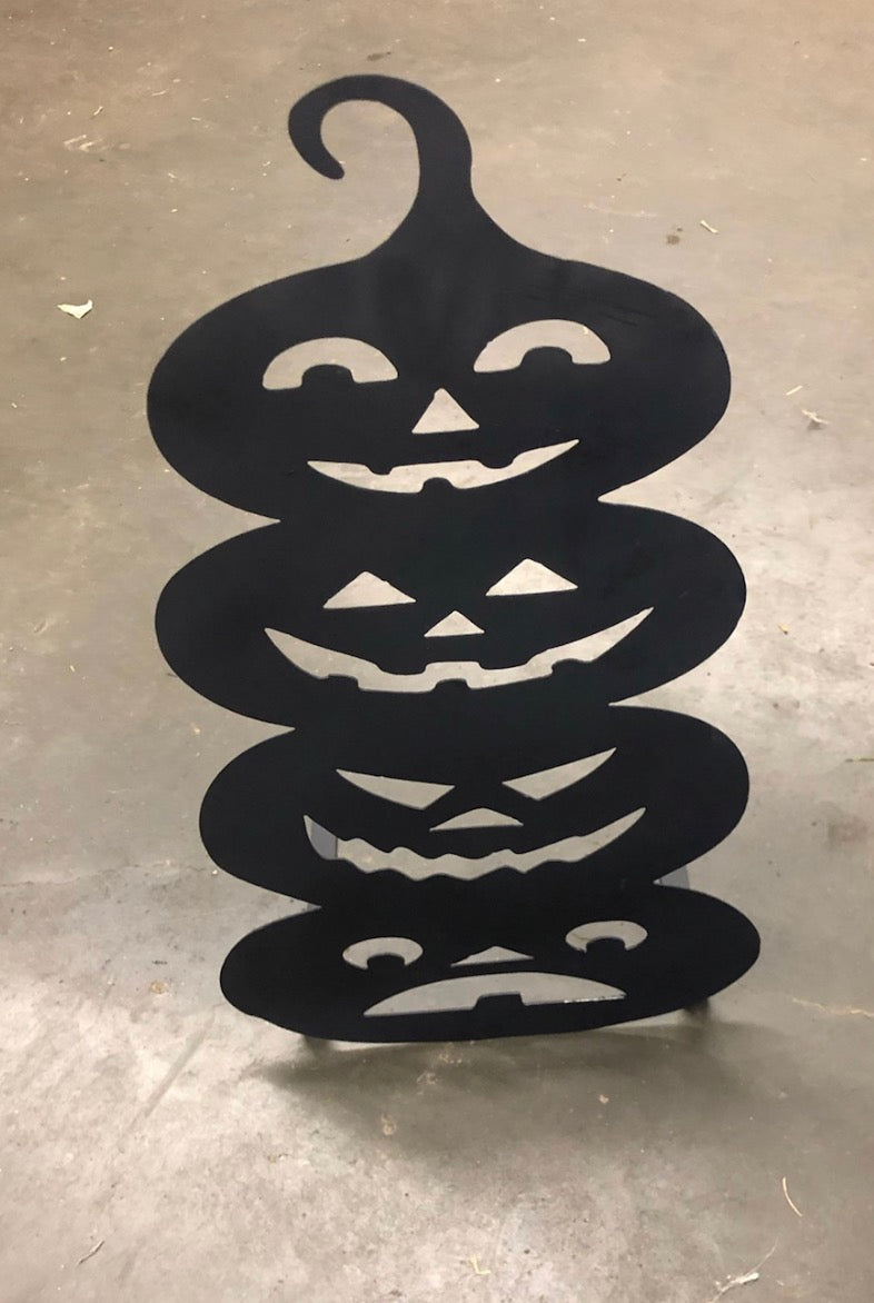 4 Stacked Carved Pumpkins