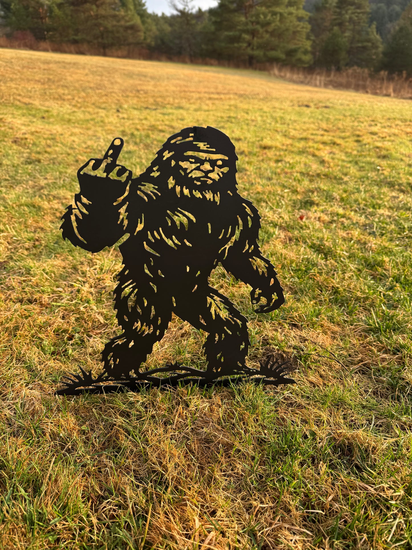 Metal Flipping Off Big Foot Stake